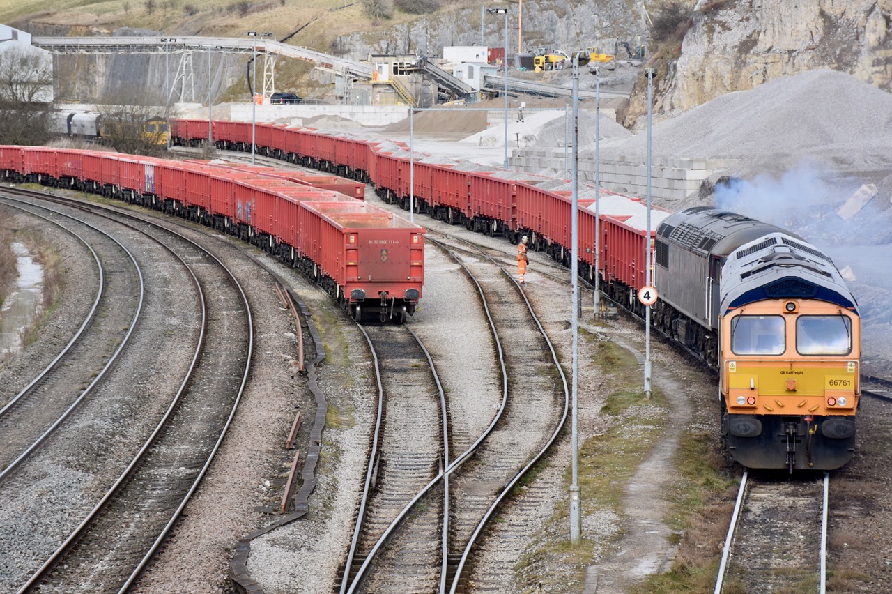 Two long freight trains in a quarry